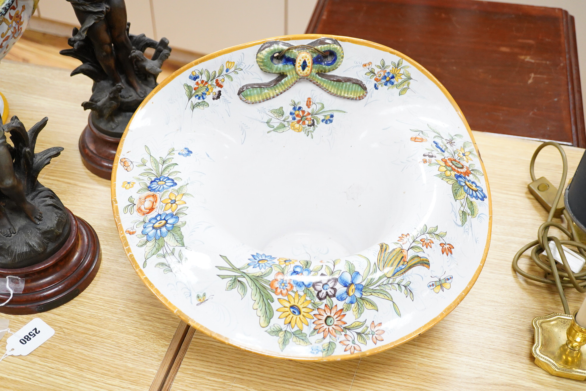 A large decorative hat shaped French faience planter, 26.5cm high